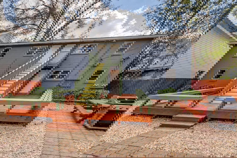 Vibrant, Colorful Condo Building With Backyard Firepit And Games - thumb 0