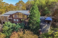 A Lake  Mountain Lodge w/ Lake Access Hot Tub  Game Room home Accommodation Alabama